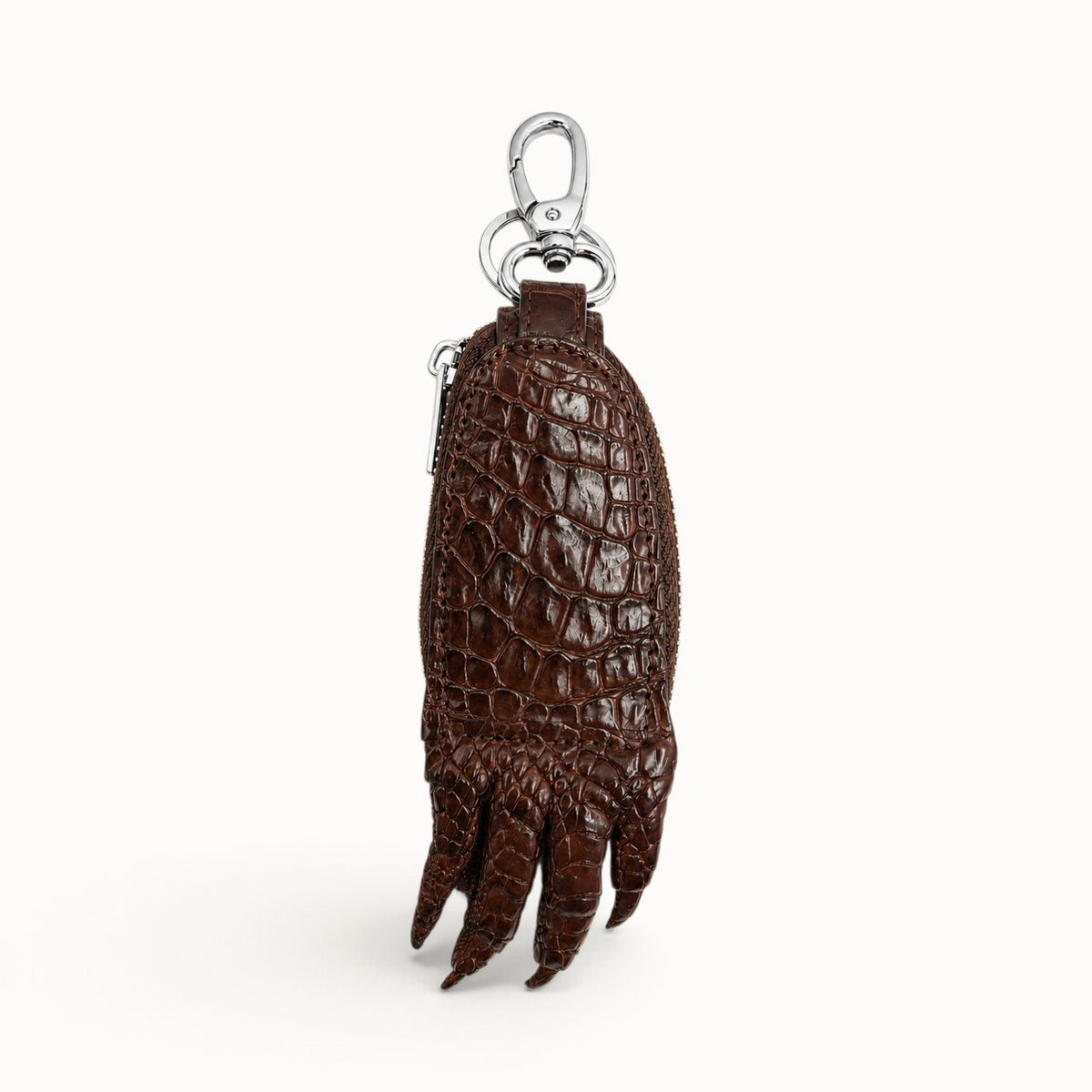 Brown Siamensis crocodile leather car key case shown from the back with natural scale pattern, silver hardware, and sculpted claw detail.